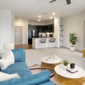 a living room with a couch and tv