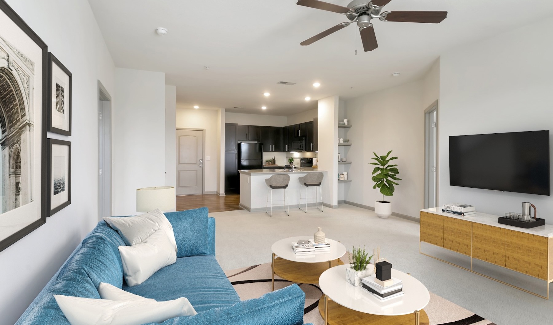 a living room with a couch and tv